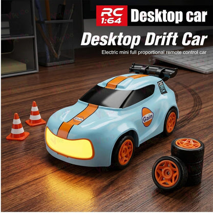 1:64 Mini RC Drift Car with Integrated Controller Storage Dome | 2.4GHz 4WD Micro Desktop Drifter, High-Speed Remote Control Car with LED Lights, Interchangable Drift Tires, Cones & Charging Cable for Kids and Adults
